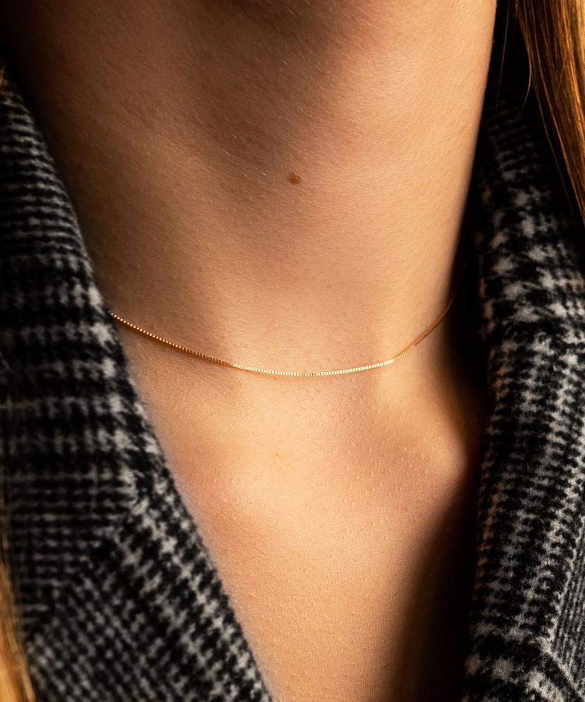 Auksinė vientisa grandinėlė "Box" 0.6mm - Goldinga