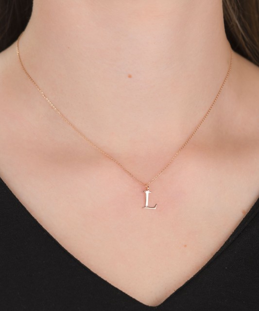 Zelta kulons ar dimanta burtu L - Goldinga