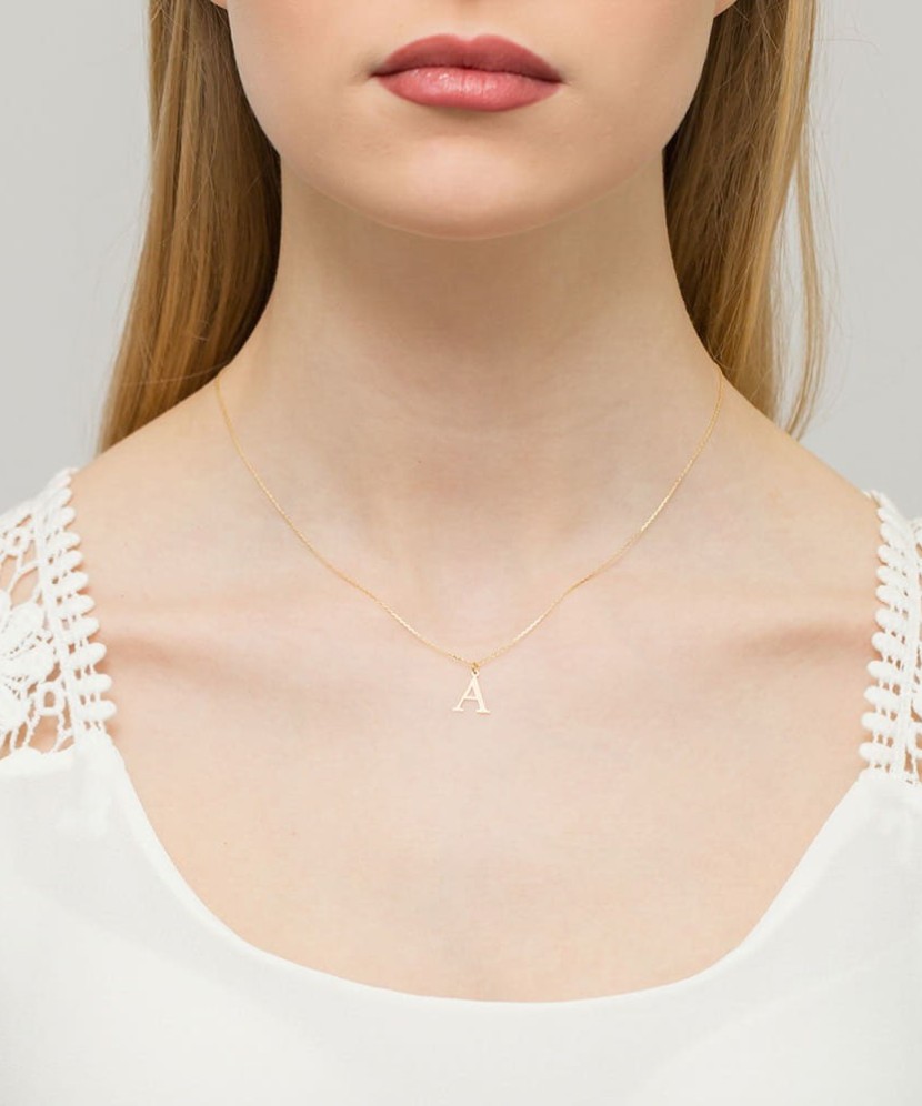 Zelta kulons ar dimanta burtu A - Goldinga