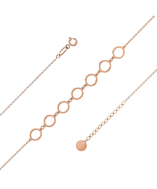 Zelta rokassprādze uz kājas - Goldinga