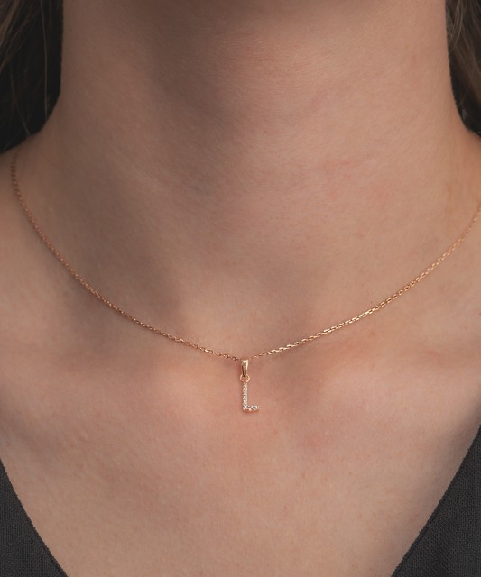 Zelta piekariņš ar cirkonijiem, L burts