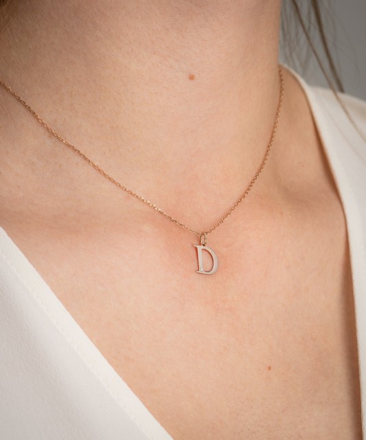 Zelta kulons ar dimanta burtu D - Goldinga