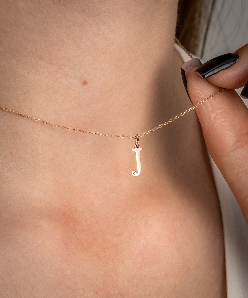 Zelta kulons ar dimanta burtu J - Goldinga