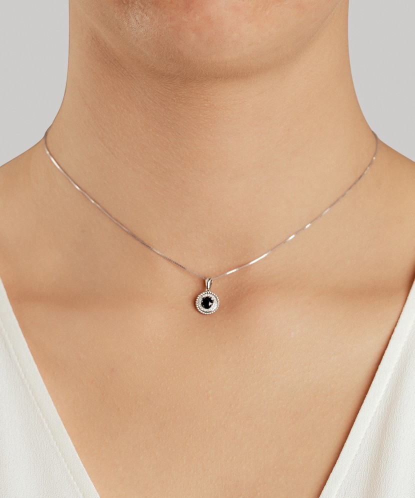 Baltā zelta kulons ar dimantiem un safīriem