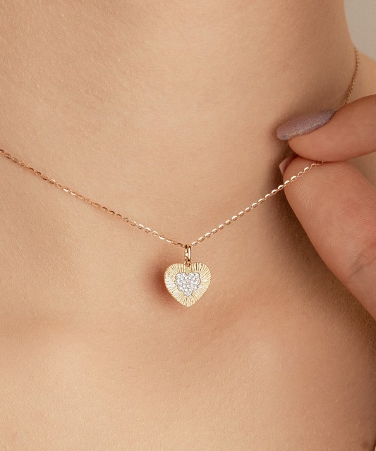 Dzeltena zelta kulons ar dimantiem un safīriem