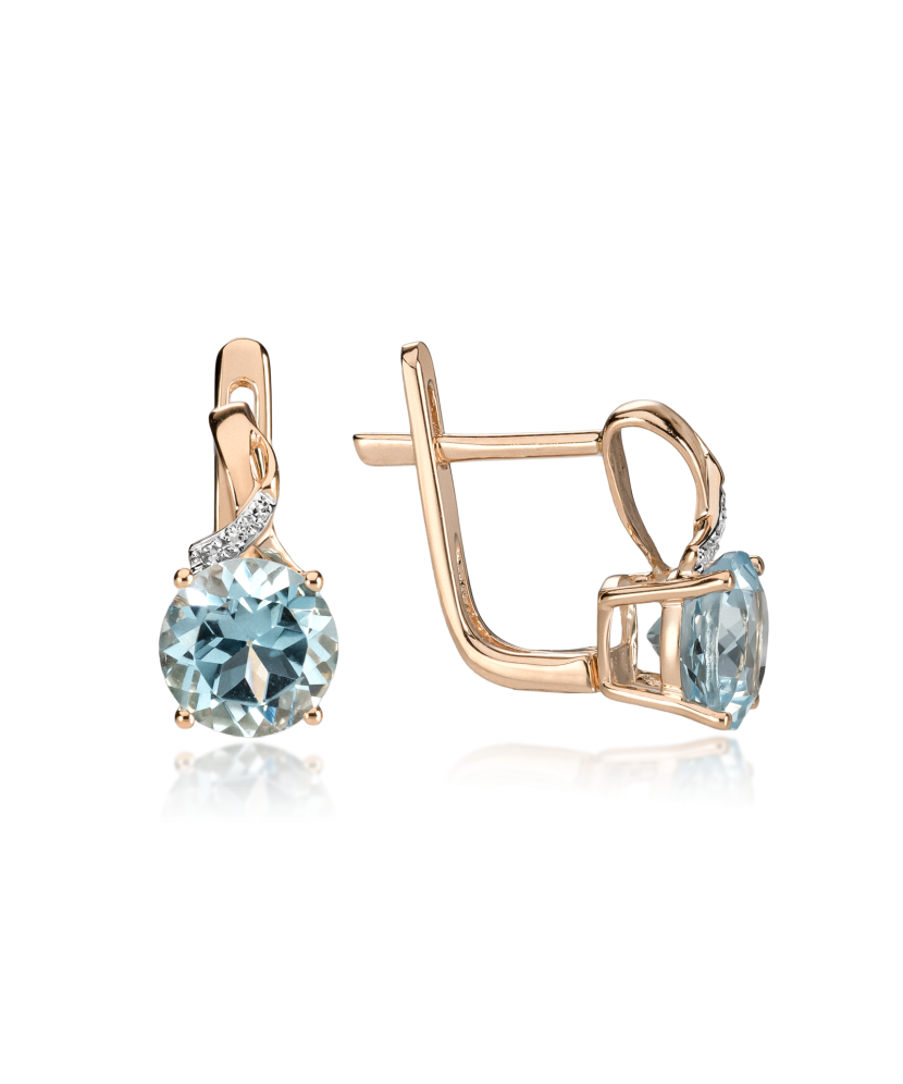 Zelta auskari ar dimantiem un topāziem