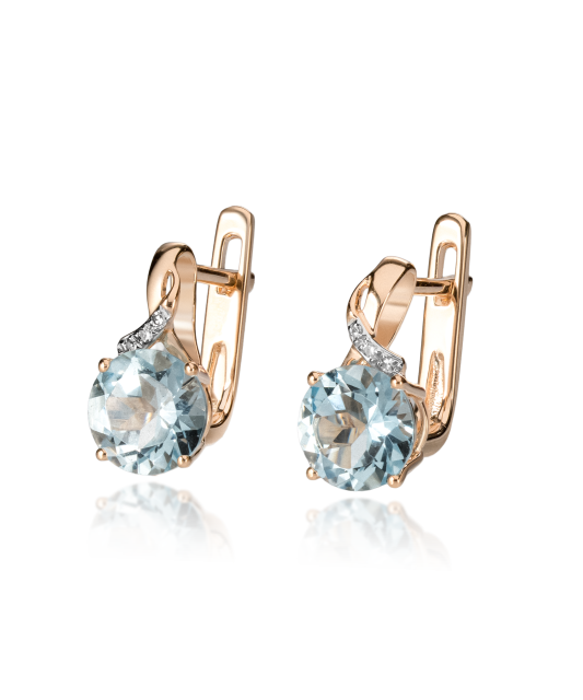 Zelta auskari ar dimantiem un topāziem