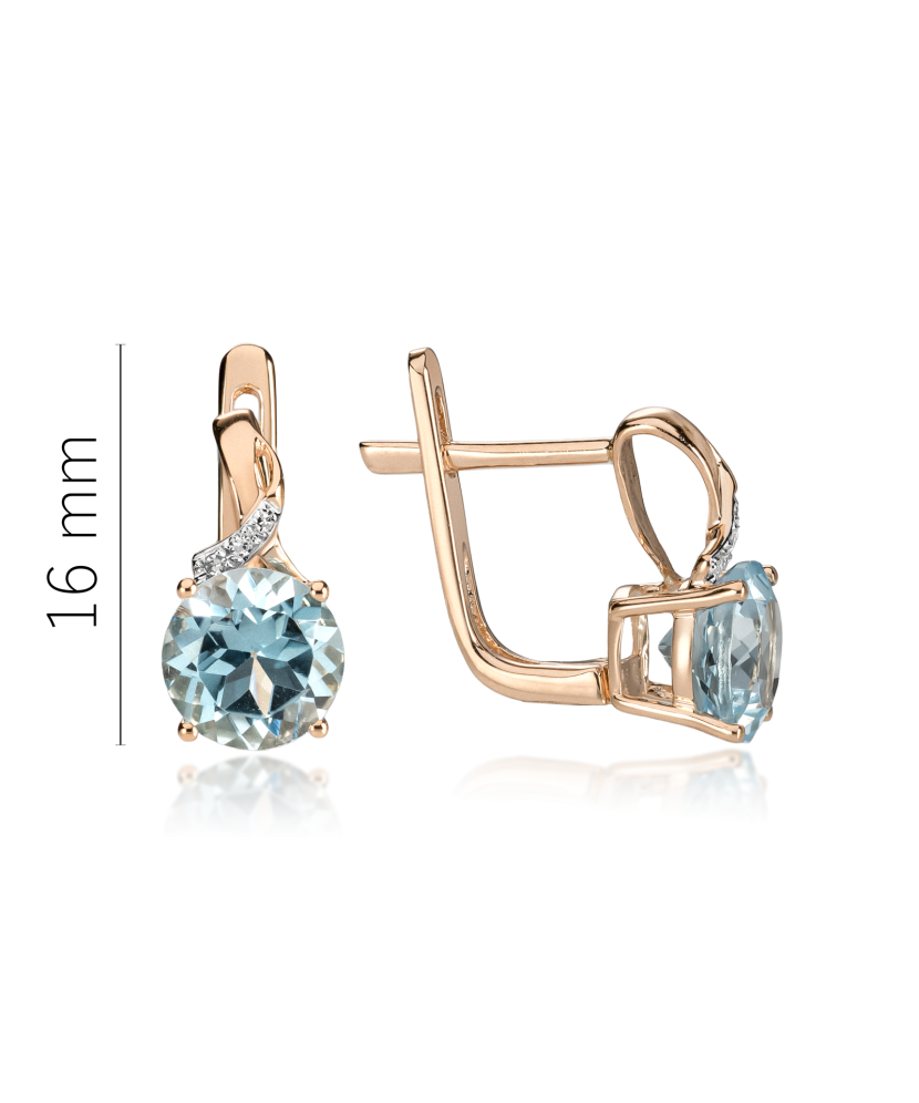 Zelta auskari ar dimantiem un topāziem