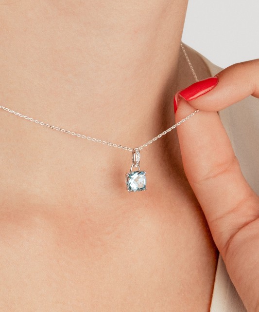 Baltā zelta kulons ar topāzu un dimantiem