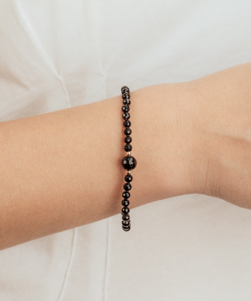 Rokassprādze ar oniksu un zeltu