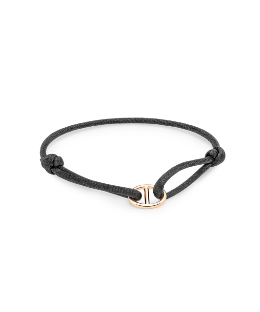 Melna diegu aproce ar zeltu