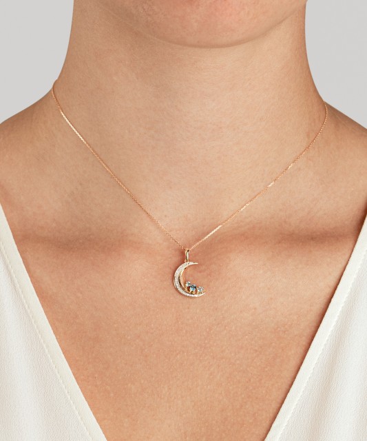 Zelta kulons ar Londonas topāziem, topāziem un dimantiem “Mēness”