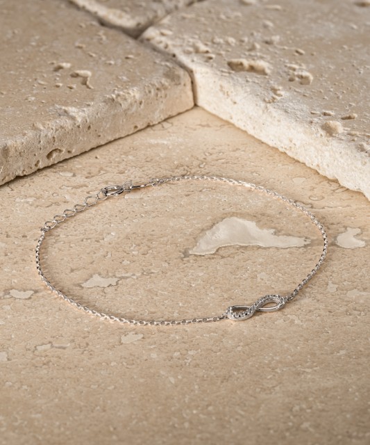 Браслет из белого золота с цирконами "Бесконечность"