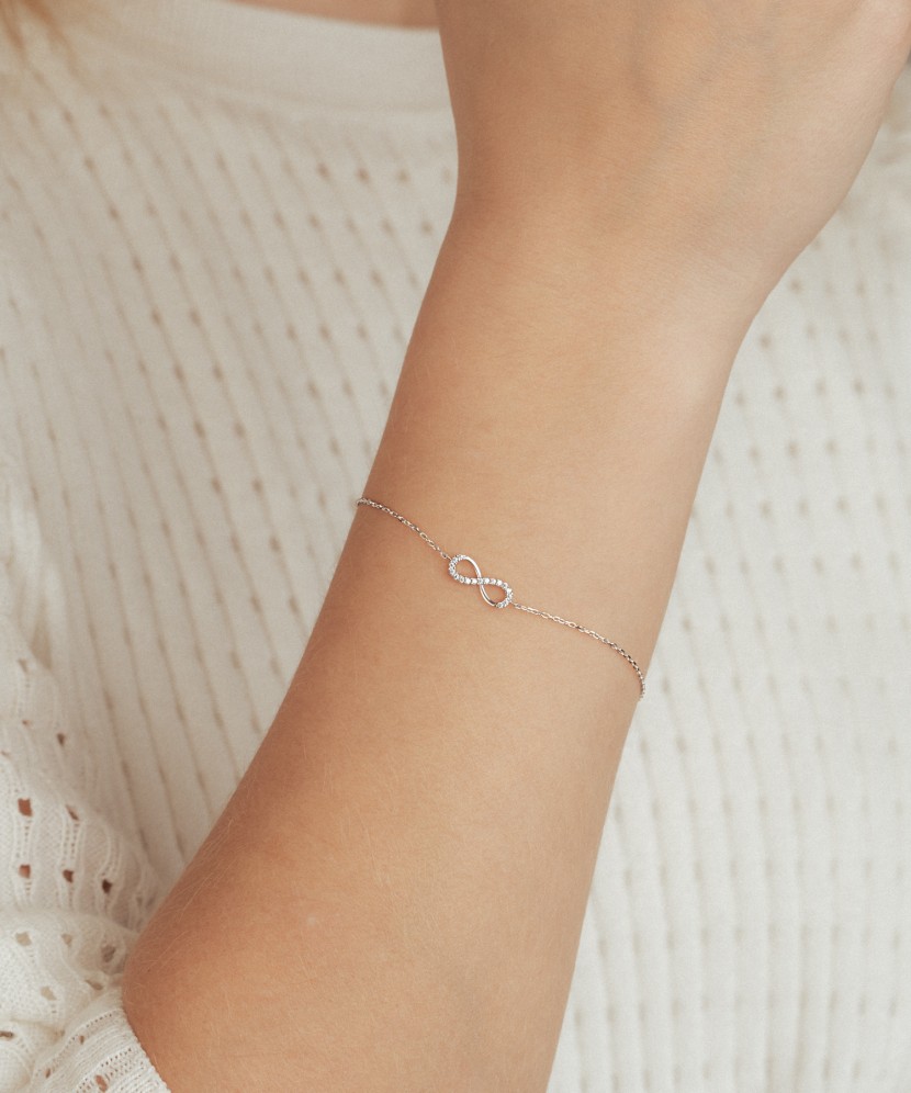 Baltā zelta aproce ar cirkoniem "Bezgalība"