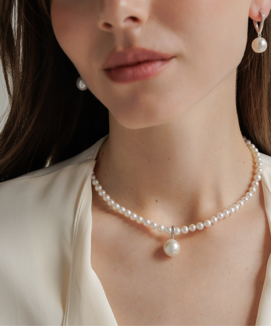 Sudraba kulons ar Edisona pērli un cirkonu