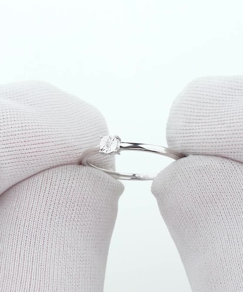 Кольцо из белого золота с бриллиантами