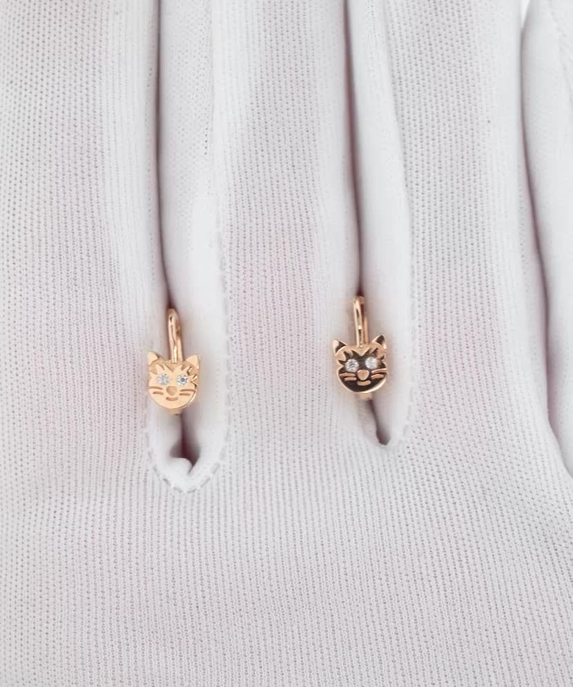 Золотые серьги с цирконами