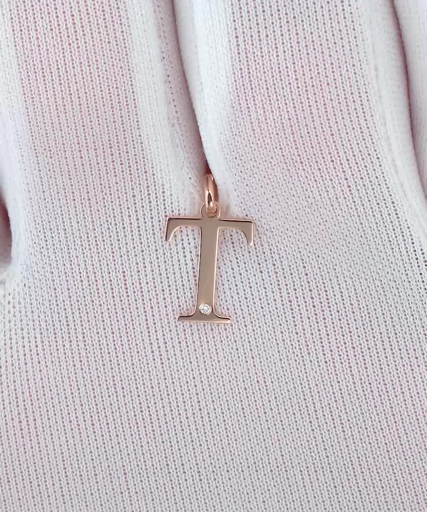 Zelta kulons ar dimanta burtu T