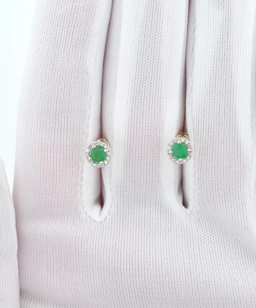 Серьги из желтого золота с бриллиантами и изумрудами