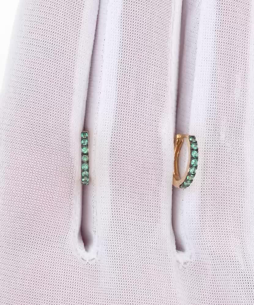 Серьги из желтого золота с изумрудами