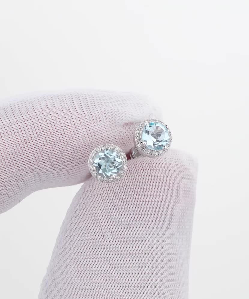 Baltā zelta auskari ar topāziem un dimantiem