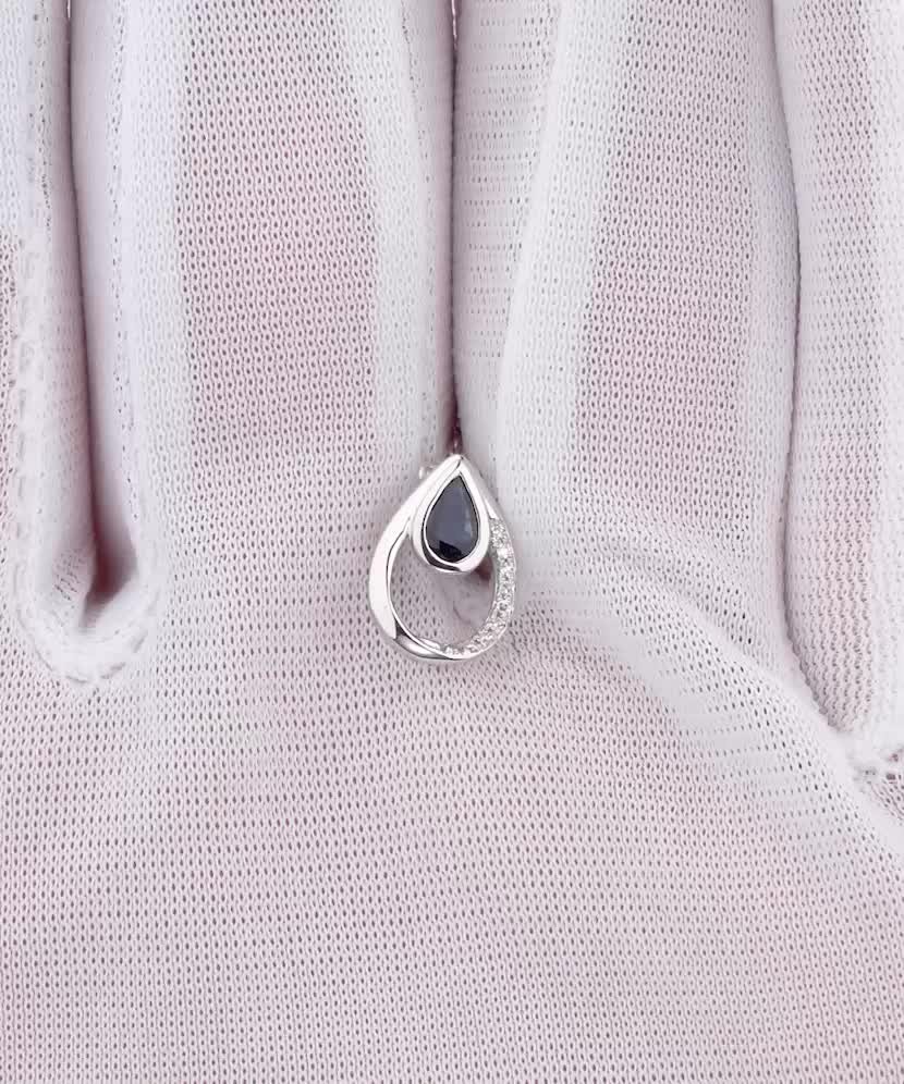 Baltā zelta kulons ar safīru un dimantiem