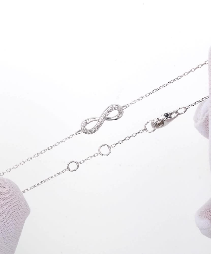 Baltā zelta rokassprādze ar dimantiem “Bezgalība”