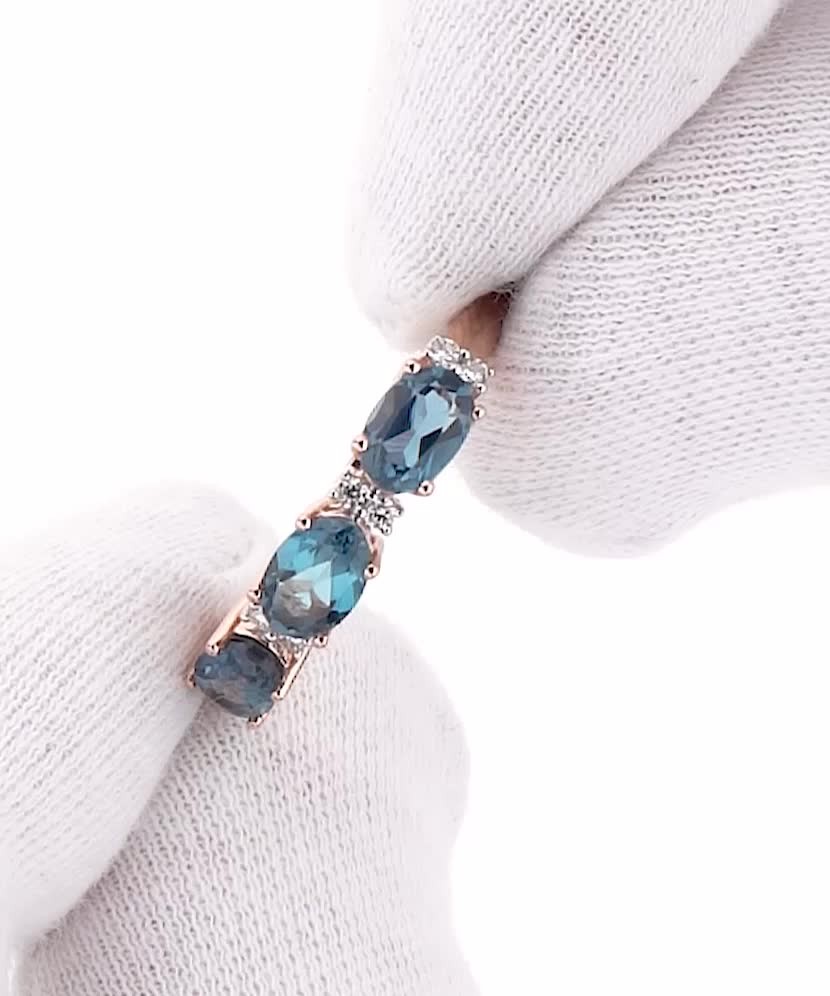 Кольцо из золота с лондон топазом и бриллианты