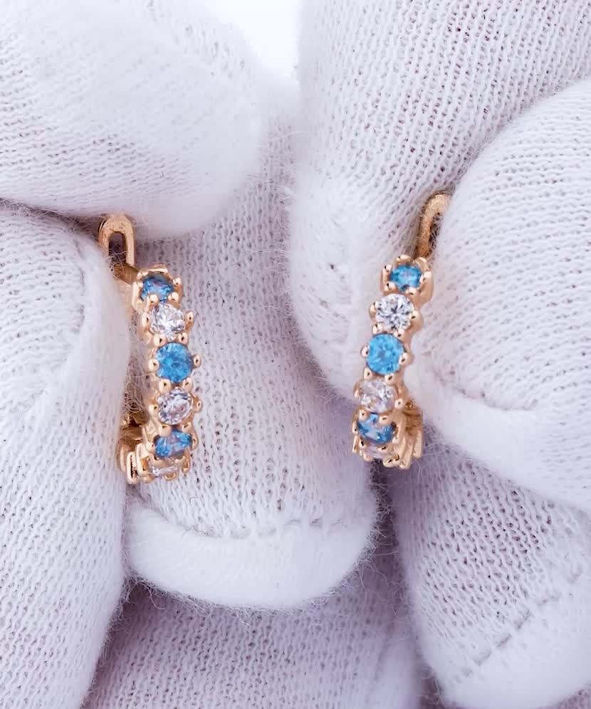 Золотые серьги с цирконами