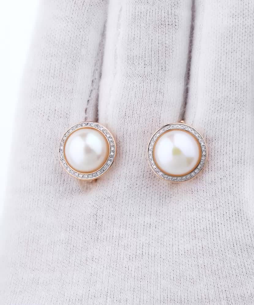 Серьги из золота с бриллиантами и жемчугом